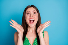 Closeup Photo Of Attractive Charming Overjoyed Lady Raise Arms Up Sly Open Mouth Listen Good News Ecstatic Winner Wear Green Dotted Tank-top Singlet Isolated Blue Color Background