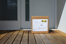 Package Box On Home Front Doo