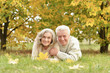 © aletia2011 - Portrait of senior couple lying on grass