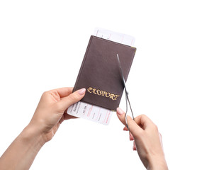 Sticker - Woman cutting passport with ticket on white background