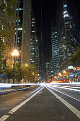 Wall Mural - Skyscrapers along Market Street in downtown San Francisco at night with long exposure