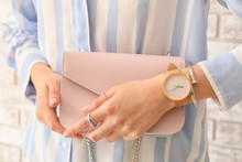 Woman With Stylish Wrist Watch And Bag, Closeup