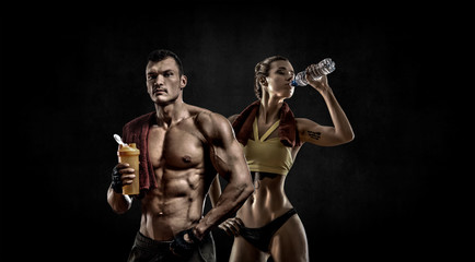 Wall Mural - couple man with woman bodybuilders