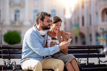 Wall Mural - Happy couple enjoying together outdoors.