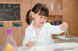 © M-image - young  girl  play science experiments for homeschooling