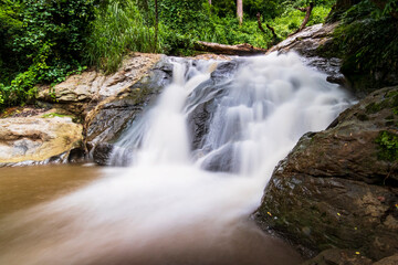 Poster - Beautiful waterfall in the forest wallpaper background