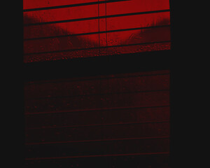 Rainy window with dark evil tones 