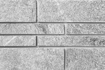 Block pattern of white stone cladding wall tile texture and seamless background