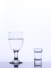 mineral water in a glass isolated white background