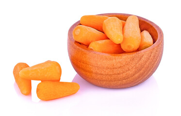 Wall Mural - Carrot in wooden bowl isolated on white background.