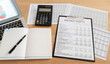 notebook with accounting financial report on accountant desk.