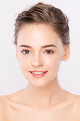 beautiful young woman with clean fresh skin, on white background, face care, facial treatment. cosme