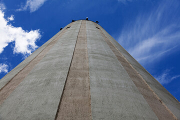 Lovanger, Norrland Sweden - August 2, 2020: water tower seen from the ground with summer sky