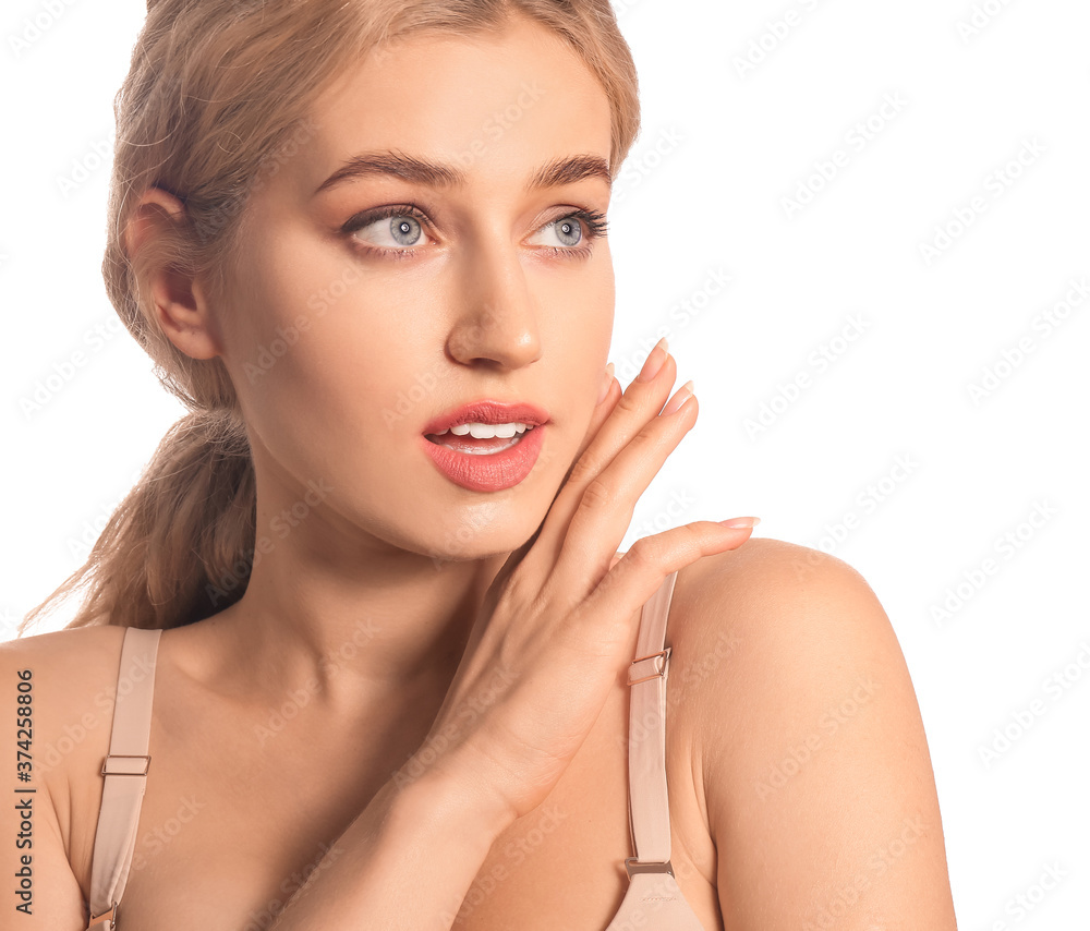 Young woman with beautiful makeup on white background