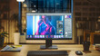 Shot of a Desktop Computer in the Modern Office with Monitor Showing Photo Editing Software. In the Background Warm Evening Lighting and Open Space Studio with City Window View