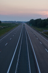 Poster - High angle shot of  a highway on a beautiful sunset