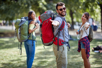 Wall Mural - Traveling together.Travel, tourism and people concept. Friends traveling together.