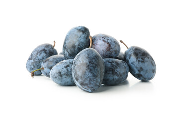 Fresh blue plums isolated on white background