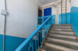© evgeniykleymenov - Russia, Moscow- February 15, 2020: interior public place, house entrance. doors, walls, staircase corridors