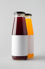 Sticker - Juice Bottle Mock-Up - Two Bottles. Blank Label