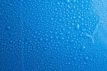 Wall Mural - water drops blue background