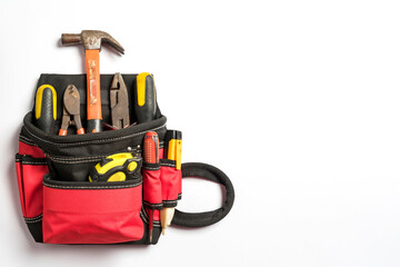 Wall Mural - Top view of Working tools for electrician,hammer,screwdriver,plier,electric drill, measure,bag,check lamp on white background.