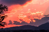 Fototapeta Na drzwi - The wonderful landscape of sunset and clouds.