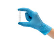 © igorkol_ter - Hand in medical glove holding glass ampule. Isolated on white.