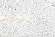 White pebble background texture. Such a stone is used in landscape design.