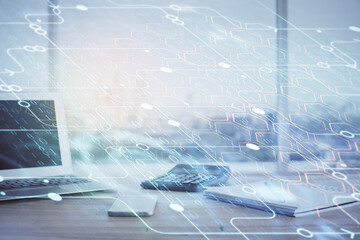 double exposure of desktop computer and technology theme hologram. concept of software development.