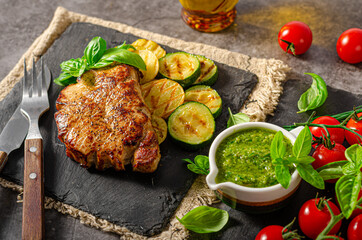 Wall Mural - Delicious pork steak with herbs sauce