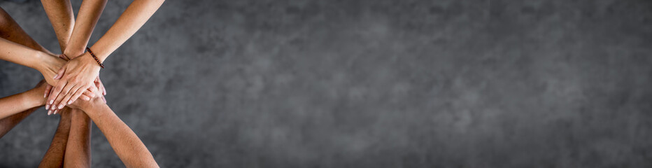 Fototapete - Stack of hands. Unity and teamwork concept.