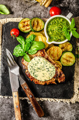 Wall Mural - Delicious pork steak with herb butter