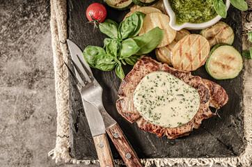 Wall Mural - Delicious pork steak with herb butter