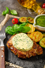 Wall Mural - Delicious pork steak with herb butter