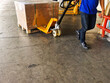 © Weerayuth - Worker driving forklift loading shipment carton boxes goods on wooden pallet at loading dock from container truck to warehouse cargo storage in freight logistics, transportation industrial, delivery