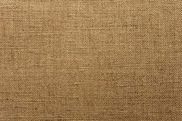 Brown background texture woven sack. The texture of a rough natural fabric.