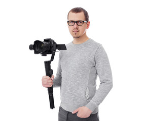 Wall Mural - professional videographer with camera on gimbal stabilizer isolated on white