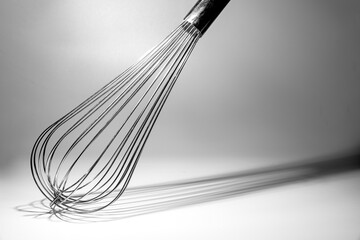 Whisk isolated against a white background