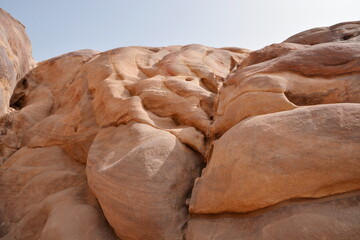 Rock faces worn smooth by centuries of exposure to the elements.