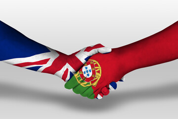 Wall Mural - Handshake between portugal and united kingdom flags painted on hands, illustration with clipping path.