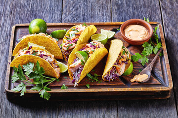 Wall Mural - fish tacos with shredded red cabbage salad
