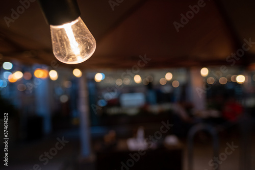 Cuadros en Lienzo NYC outdoor dining light bulb portrait