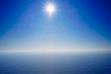 Seascape with a bright sun on a blue sky