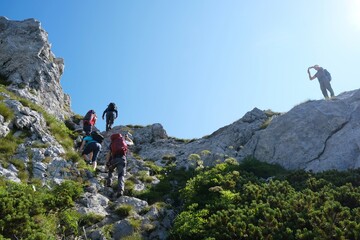 Silhouette of turists on trail in beautiful National Park Risnjak, Croatia