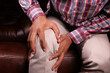 © Towfiqu Barbhuiya  - Close up on man suffering knee joint pain