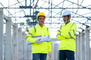 Aufkleber - Construction manager and architect working on building site.