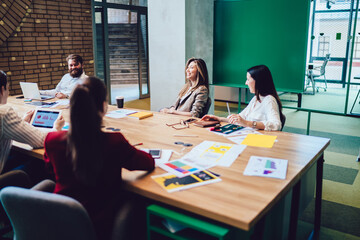 Wall Mural - Group of young workers meeting at design office