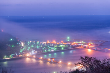 Wall Mural - A fantastic image of fog down the river was shot in Japan