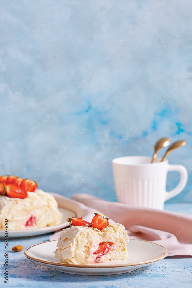 Delicious meringue roll with strawberry on color background